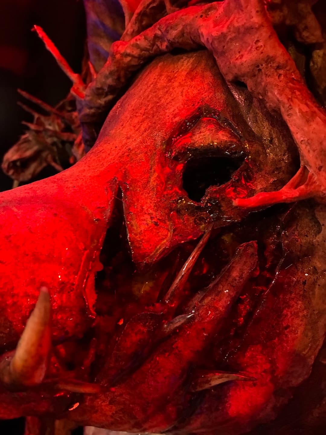 A mask and special effects piece made at Tomb Gallery