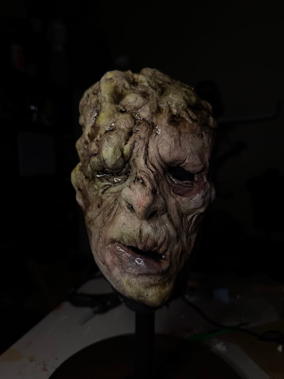 A mask and special effects piece made at Tomb Gallery